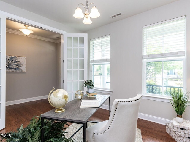 437 Henmore Brook Dr, Cary, NC 27519 - dining area featuring a chandelier, baseboards, wood finished floors, and ornamental molding