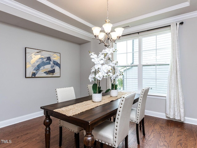 437 Henmore Brook Dr, Cary, NC 27519 - dining room with a chandelier, baseboards, wood finished floors, and crown molding