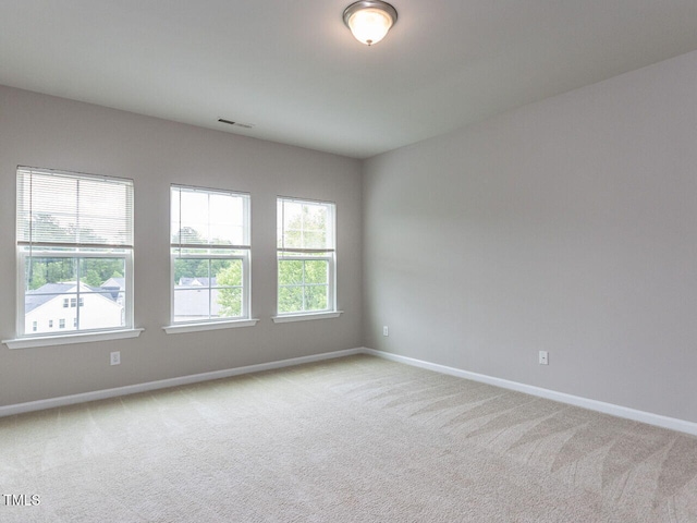 437 Henmore Brook Dr, Cary, NC 27519 - carpeted spare room featuring baseboards