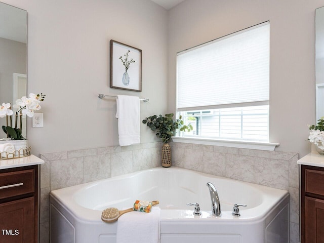 437 Henmore Brook Dr, Cary, NC 27519 - bathroom featuring vanity and a garden tub