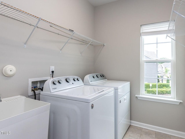 437 Henmore Brook Dr, Cary, NC 27519 - laundry area with separate washer and dryer and baseboards