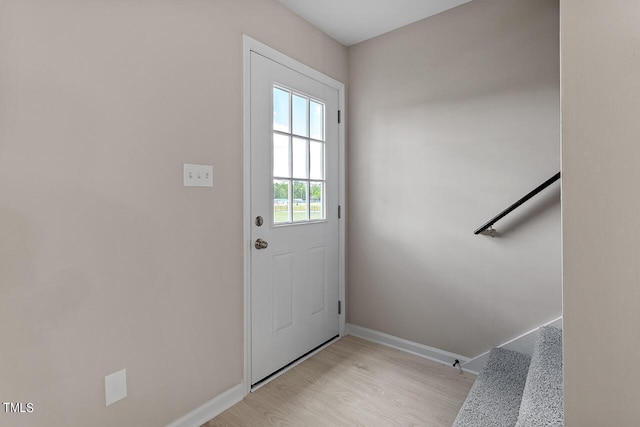 353 E Williams St, Angier, NC 27501 - doorway to outside featuring light wood-style flooring, baseboards, and stairs