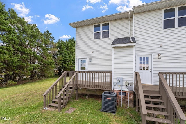 353 E Williams St, Angier, NC 27501 - back of house featuring stairs, central AC, a deck, and a yard