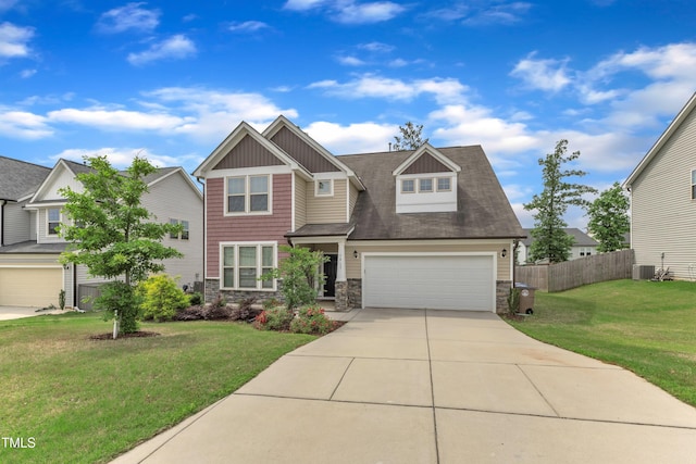 craftsman-style house featuring stone siding, driveway, board and batten siding, an attached garage, and central air condition unit