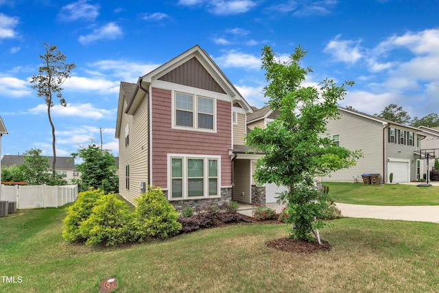 view of front of house with an attached garage, stone siding, board and batten siding, driveway, and central air condition unit