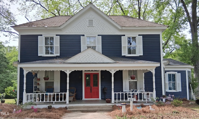 417 S Main St, Warrenton, NC 27589 - victorian-style house featuring a porch and a shingled roof