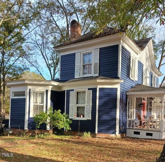 417 S Main St, Warrenton, NC 27589 - view of front of property with a chimney and covered porch