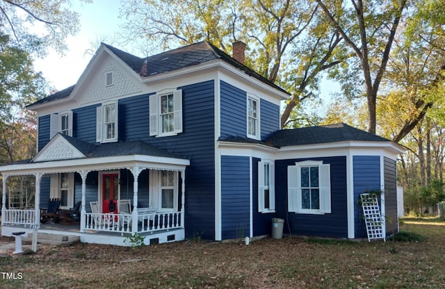 417 S Main St, Warrenton, NC 27589 - victorian home with a porch and a chimney