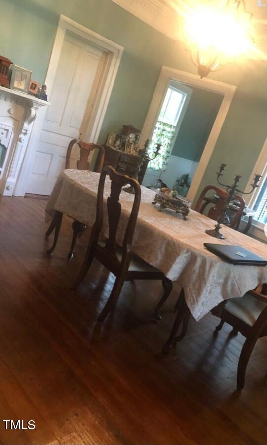 417 S Main St, Warrenton, NC 27589 - dining space featuring wood finished floors and plenty of natural light