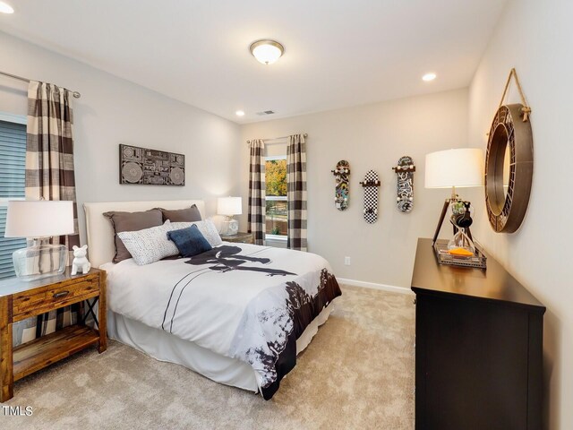 265 Sutherland Dr, Franklinton, NC 27525 - bedroom featuring light carpet, recessed lighting, and baseboards