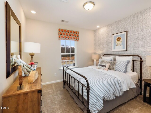265 Sutherland Dr, Franklinton, NC 27525 - bedroom with carpet floors and baseboards