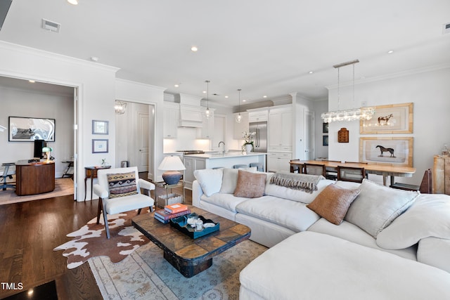620 Wade Ave Unit 505, Raleigh, NC 27605 - living area featuring dark wood-style flooring, ornamental molding, and recessed lighting