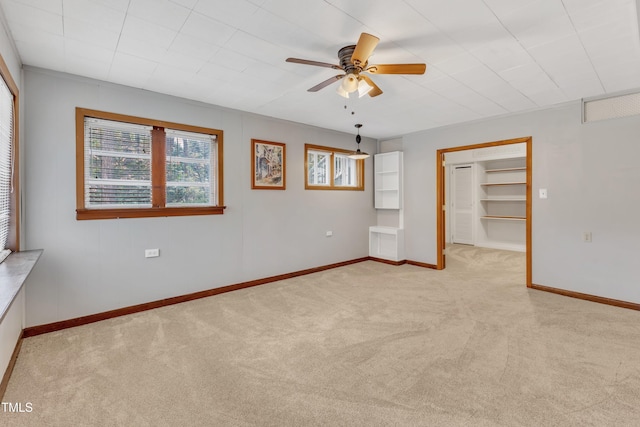 2600 Wade Ave, Raleigh, NC 27607 - unfurnished room with light carpet, a ceiling fan, and baseboards