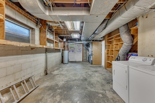 2600 Wade Ave, Raleigh, NC 27607 - below grade area with water heater, washing machine and dryer, and healthy amount of natural light