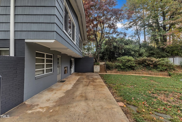 2600 Wade Ave, Raleigh, NC 27607 - view of side of home featuring a patio