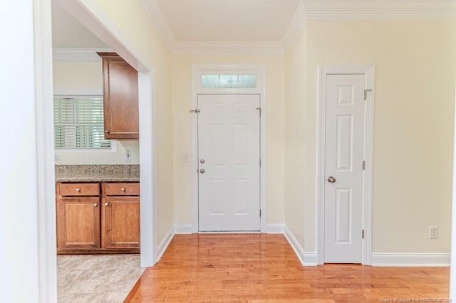 1536 Louisiana Ln, Sanford, NC 27332 - entryway featuring light wood-style flooring, ornamental molding, and baseboards