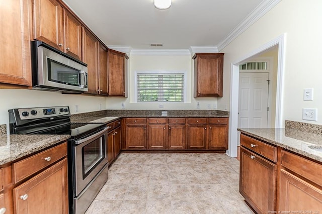 1536 Louisiana Ln, Sanford, NC 27332 - kitchen with stainless steel appliances, ornamental molding, stone countertops, light tile patterned flooring, and brown cabinetry