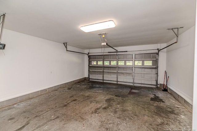 1536 Louisiana Ln, Sanford, NC 27332 - garage with a garage door opener and baseboards