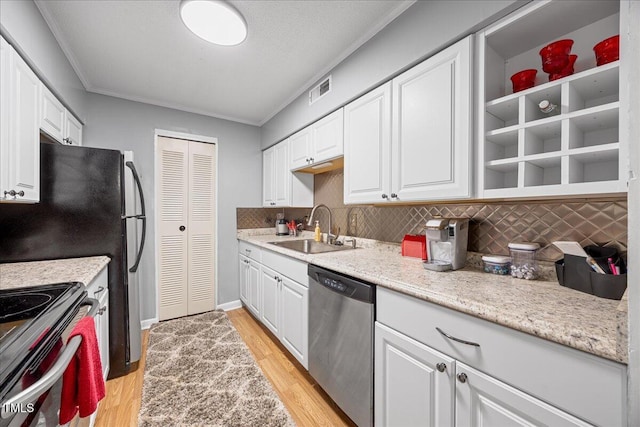 4709 Edwards Mill Rd Unit H, Raleigh, NC 27612 - kitchen featuring stainless steel dishwasher, a sink, white cabinets, and crown molding