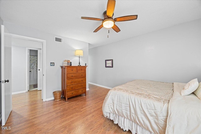 4709 Edwards Mill Rd Unit H, Raleigh, NC 27612 - bedroom with light wood-style floors, baseboards, and ceiling fan