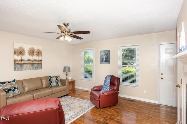 809 Maple Shade Ln, Apex, NC 27502 - living room with wood finished floors, ceiling fan, baseboards, and a textured ceiling