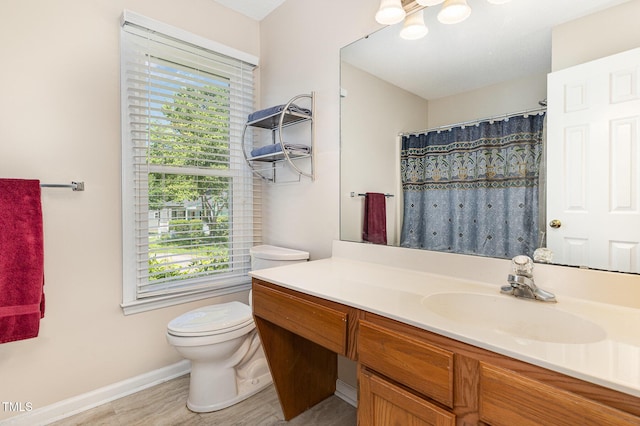 809 Maple Shade Ln, Apex, NC 27502 - full bathroom with toilet, plenty of natural light, vanity, and wood finished floors