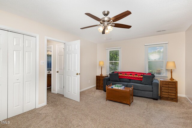 809 Maple Shade Ln, Apex, NC 27502 - living area featuring carpet floors, ceiling fan, and baseboards