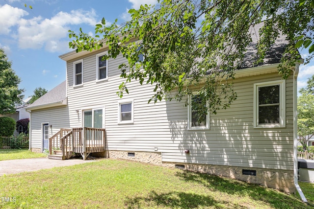 809 Maple Shade Ln, Apex, NC 27502 - rear view of house featuring crawl space, a yard, and a shingled roof