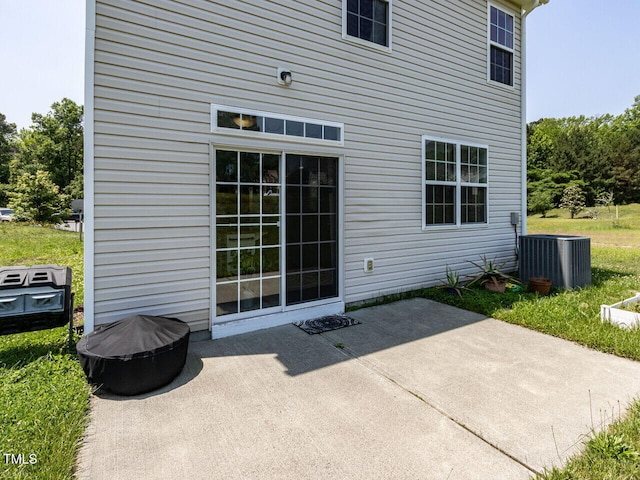 3507 Portico Ln, Durham, NC 27703 - view of patio with central AC and an outdoor fire pit