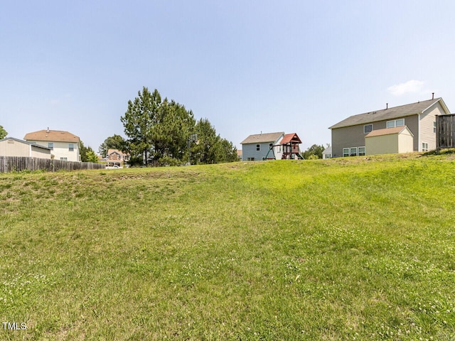 3507 Portico Ln, Durham, NC 27703 - view of yard with a playground and fence