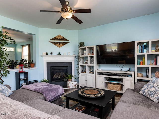 3507 Portico Ln, Durham, NC 27703 - living area with a glass covered fireplace and ceiling fan