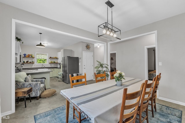 dining space with baseboards