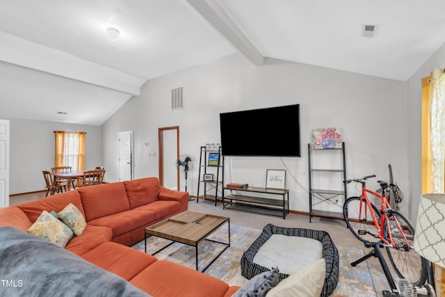carpeted living area featuring baseboards
