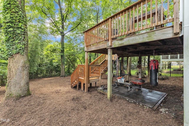 view of yard featuring stairs and a deck