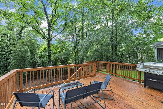 wooden terrace with grilling area