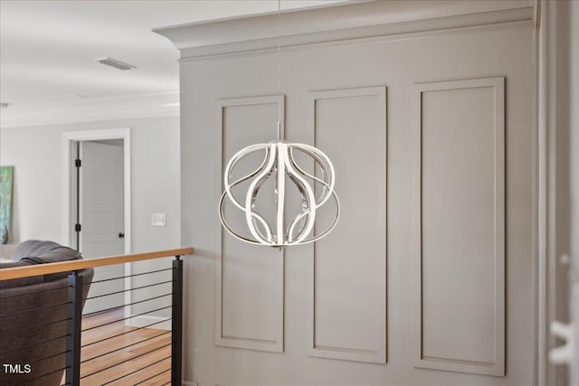204 Woodstaff Ave, Wake Forest, NC 27587 - detailed view of ornamental molding and a chandelier