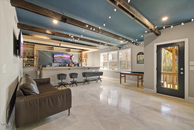 204 Woodstaff Ave, Wake Forest, NC 27587 - living room with a dry bar, finished concrete floors, baseboards, and beamed ceiling