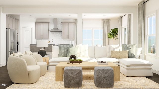 living room featuring ornamental molding and wood finished floors