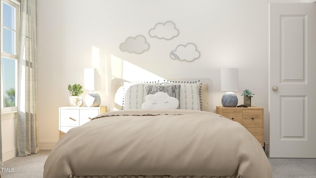 carpeted bedroom with multiple windows