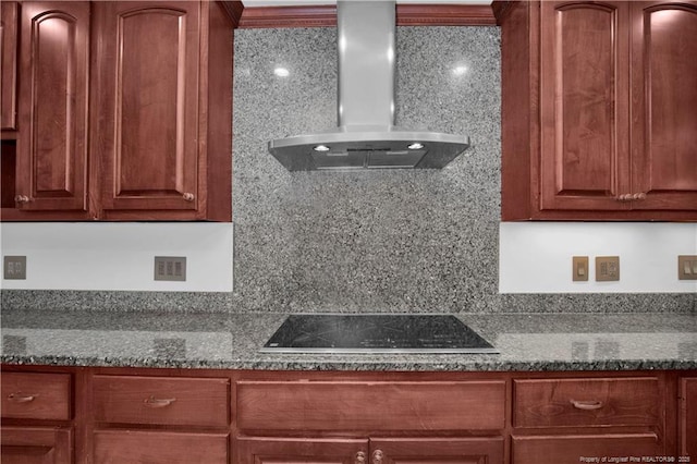 5704 Kindley Dr, Fayetteville, NC 28311 - kitchen with black electric cooktop, extractor fan, and dark stone countertops