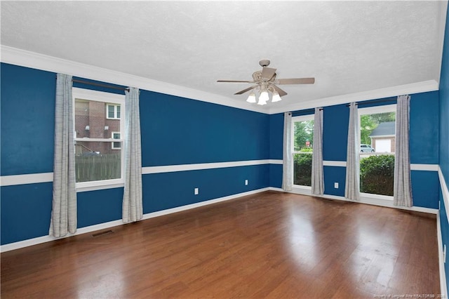 5704 Kindley Dr, Fayetteville, NC 28311 - empty room with a ceiling fan, wood finished floors, crown molding, baseboards, and a textured ceiling