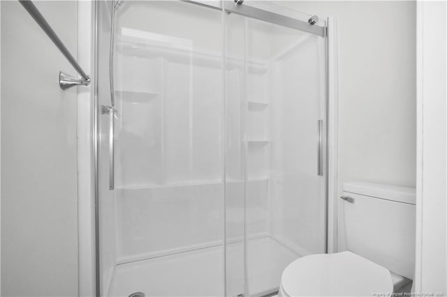 5704 Kindley Dr, Fayetteville, NC 28311 - bathroom featuring toilet and a stall shower