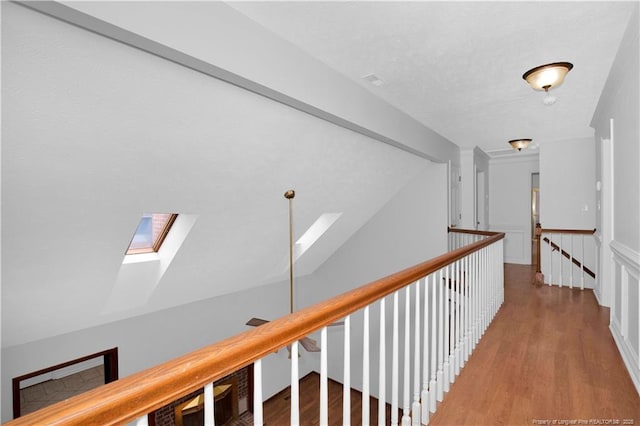 5704 Kindley Dr, Fayetteville, NC 28311 - hall with a skylight, wood finished floors, and an upstairs landing