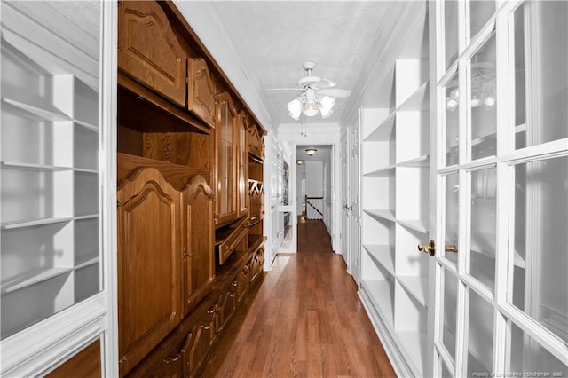5704 Kindley Dr, Fayetteville, NC 28311 - hall with crown molding, dark wood finished floors, and a textured ceiling