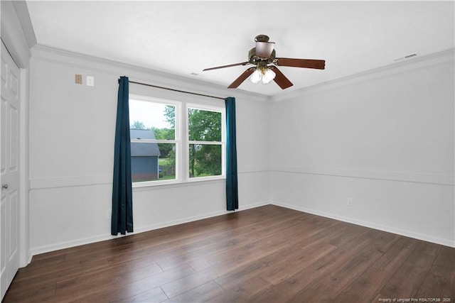 5704 Kindley Dr, Fayetteville, NC 28311 - empty room featuring ceiling fan, ornamental molding, dark wood-style floors, and baseboards