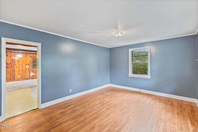 2324 Stevens Rd, Raleigh, NC 27610 - spare room with ornamental molding, wood finished floors, and baseboards