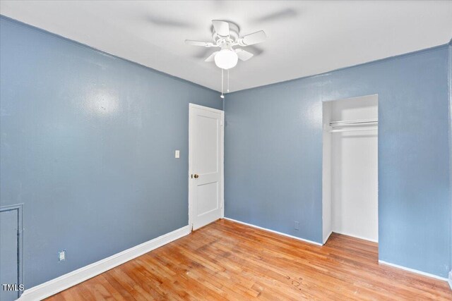 2324 Stevens Rd, Raleigh, NC 27610 - unfurnished bedroom with light wood-style flooring, a closet, ceiling fan, and baseboards