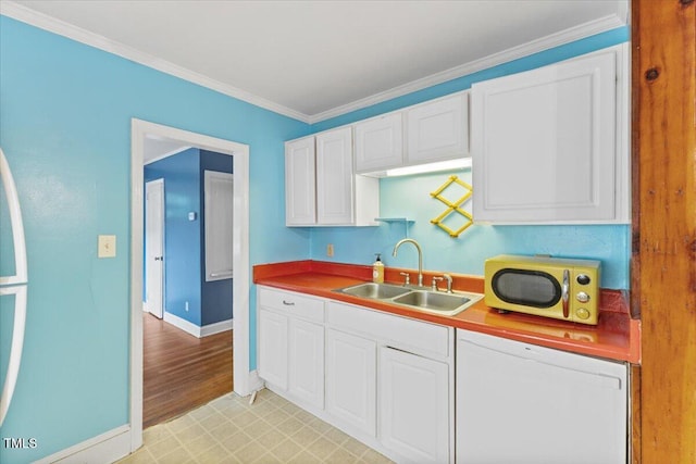 2324 Stevens Rd, Raleigh, NC 27610 - kitchen with a sink, white dishwasher, white cabinets, crown molding, and baseboards