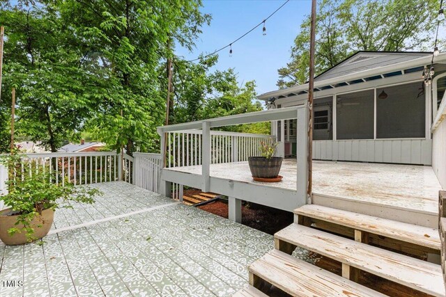 2324 Stevens Rd, Raleigh, NC 27610 - deck featuring a sunroom