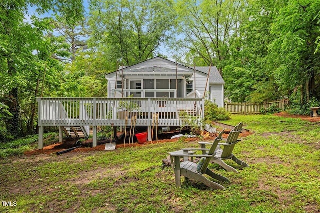 2324 Stevens Rd, Raleigh, NC 27610 - back of house featuring a wooden deck, stairs, and a sunroom